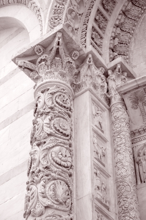 Detail on Facade of Cathedral Church Baptistry, Pisa; Italy in Black and White Sepia Toneの写真素材
