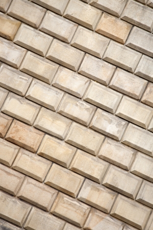 Close-up of Yellow Brick Wall Backgroundの写真素材