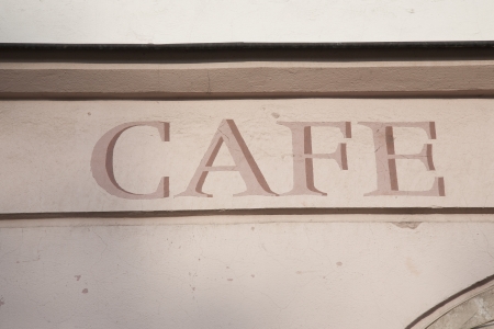 Cafe Sign on Cream Wallの写真素材