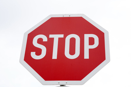Red Stop Traffic Sign on White Background