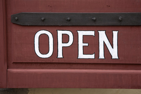 Open Sign outside Bar Restaurant or Cafeの写真素材