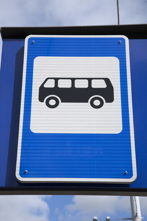 Blue Bus Stop Signの写真素材