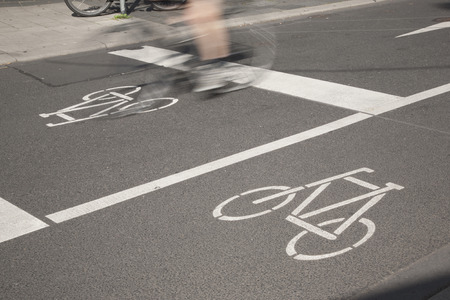 Bike Lane and Cyclist, Cologne; Germanyの写真素材