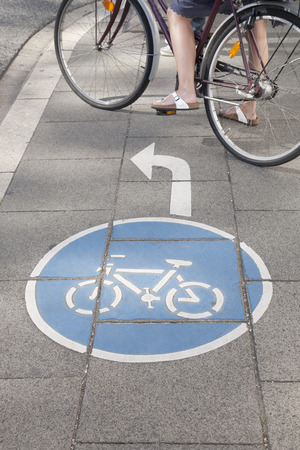 Bike Lane and Cyclist, Bonn, Germanyの写真素材
