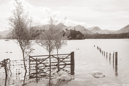 Derwent Water, Keswick, Lake District, England, UK in Black and White Sepia Toneの写真素材