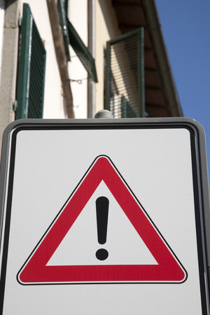 Exclamation Traffic Sign in Urban Settingの写真素材