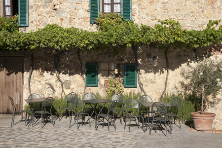 Cafe Table and Chairs; Tuscany; Italyの写真素材