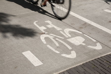 Bike Symbol and Cyclist, Den Haag - the Hague; Holland; Netherlandsの写真素材