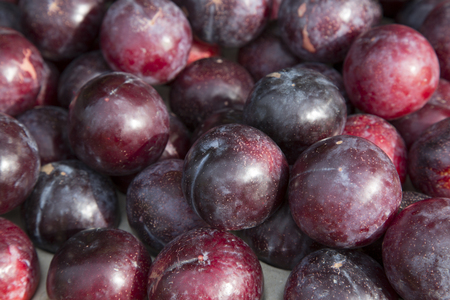 Plum Background on Market Stallの写真素材