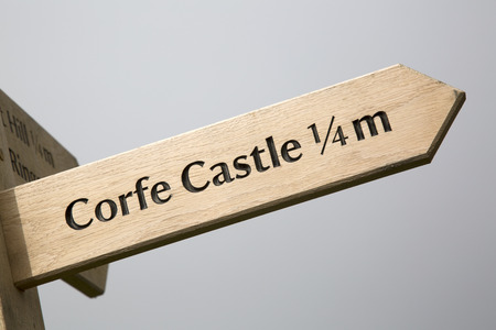 Corfe Castle Signpost, Dorset, England, UKの写真素材