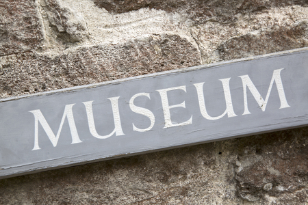 Closeup of Museum Sign on Diagonal Slantの写真素材