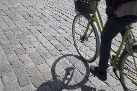 Cyclist on Cobblestones, Stockholm, Swedenの写真素材
