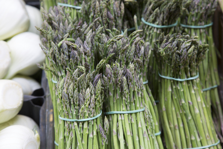 Green Asparagus Background on Market Stallの写真素材