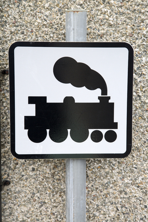Steam Railway Sign against Stone Wallの写真素材