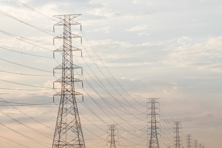 High voltage electricity pylon after sunset の写真素材