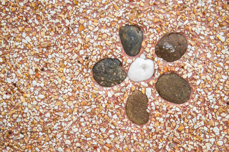 stones in sand texture backgroundの写真素材