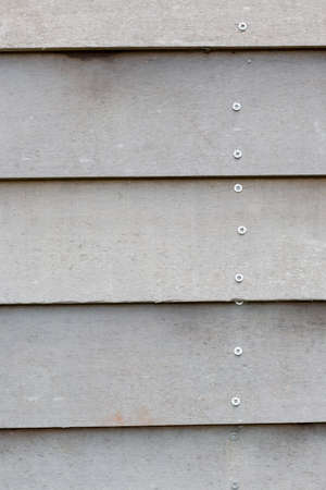 A wall made out of wooden planksの写真素材
