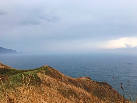Nature beauty of the hill, sky and seaの写真素材