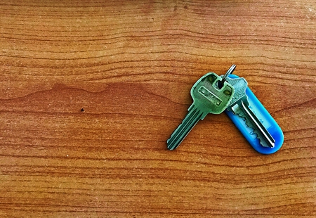 A key chain on the wooden tableの写真素材