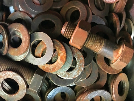 Second hand screw nut and screw ring. Shot from top view of the containerの写真素材