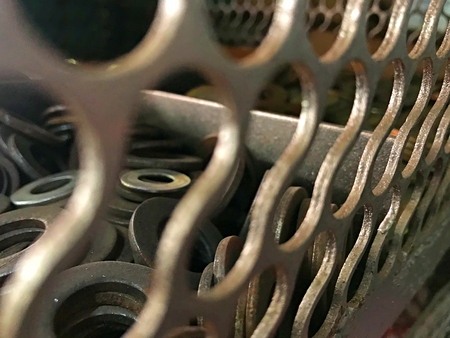 Screw nut ring in the container cage waiting for customer to buyの写真素材