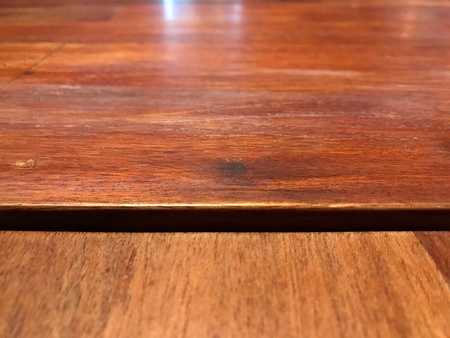 Close up shot on the wooden table in the restaurantの写真素材