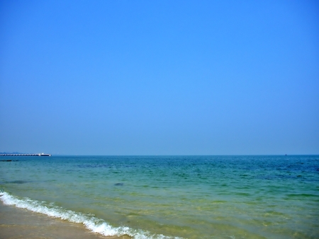 The beauty of sea in the summer and spring at the shore, beach with horizon and blueskyの写真素材