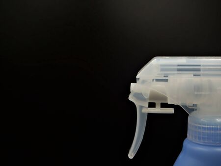 The foucs shot on the clear spray head with black backgroundの写真素材