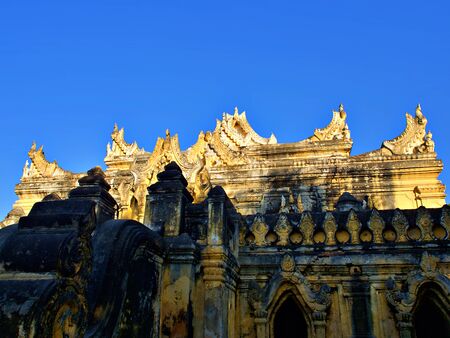 The main monastry structure of Maha Aungmye Bonzan (MeNu Brick Monastry) with blue sky in Inwa, Thailandの写真素材