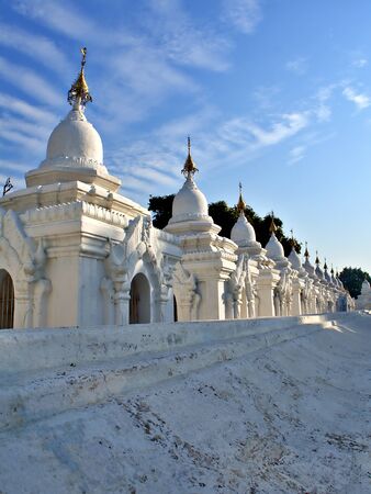The pagoda of Kuthodaw Pagoda with wave of cloud in Mandalay, Myanamrのeditorial素材