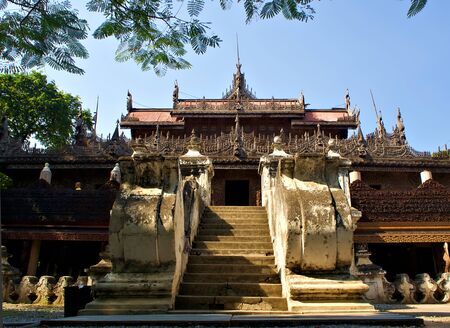 The entrance ladder to the Shwenandaw Monastery, the famous teak monastery of Mandalay, Myanmarのeditorial素材