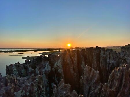 The sunset and the clear blue sky with twilight at U-Being Bridge, Mandalay, Myanmarの写真素材