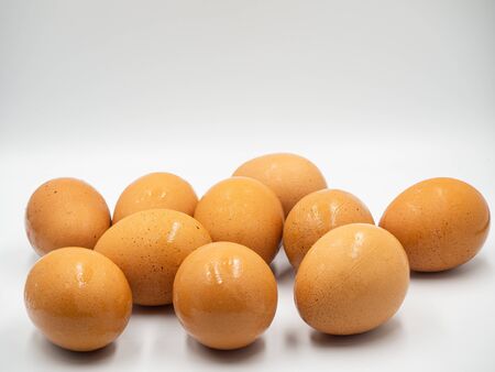 Egg are place closely on the white floor and background (no social distancing)の写真素材