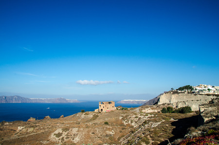 View of the ocean and blue sky with cliff as a foregroundの写真素材
