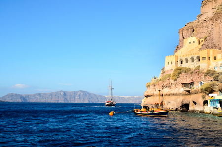 A fortress built on the cliff by th sea in Santorini, Greeceの写真素材
