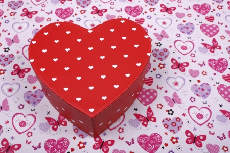 An image showing the concept of valentines  day with a heart shaped gift boxの写真素材