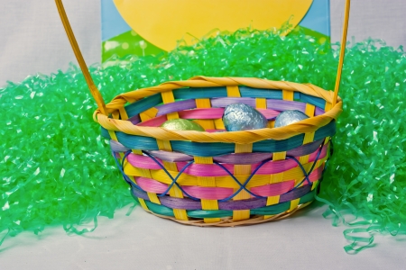 An image showing the concept of Easter with eggs in a basketの写真素材