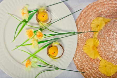 An image showing the concept of Easter with eggs and a bonnetの写真素材