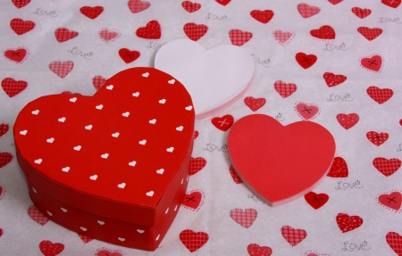 An image showing the concept of Valentines day with a gift and heartsの写真素材