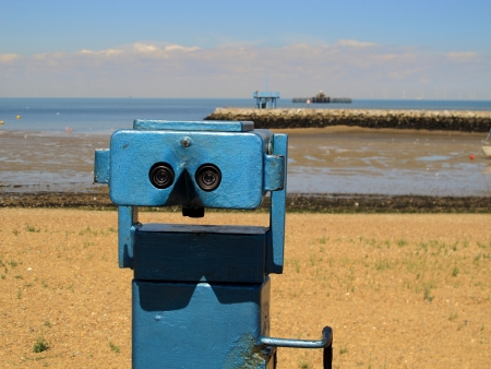 An image showing seaside binoculars to look out at the oceanの写真素材