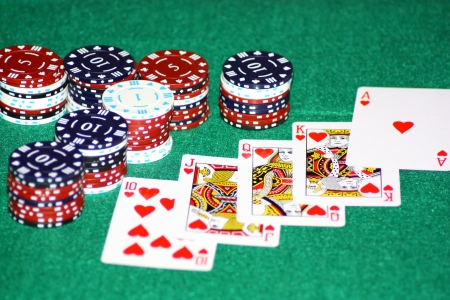 A hand of cards to take the potの写真素材