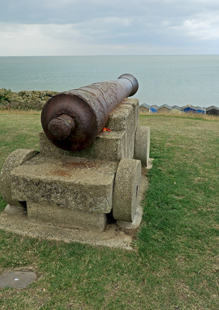Rusty old canon overlooking Tenderton beachの写真素材