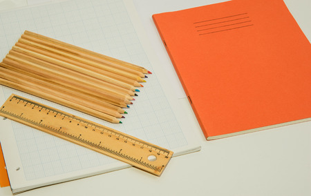 The concept of learning shown with coloured pencils on a background of graph paperの写真素材