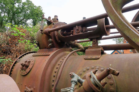 A close up view of the working parts of an old traction engine