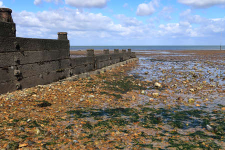 A view looking along the Wooden Groyne on the beach at Whitstable