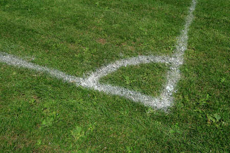 White Corner marking on a green fieldの写真素材