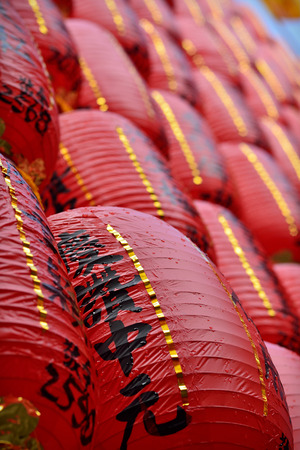 Red lanterns for blessing are lit and arrayed like a wall at Keelung Mid-Summer Ghost Festival のeditorial素材