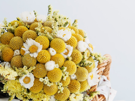 Close-up on the dried flowers with basket の写真素材