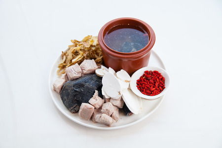 Black chicken soupの写真素材