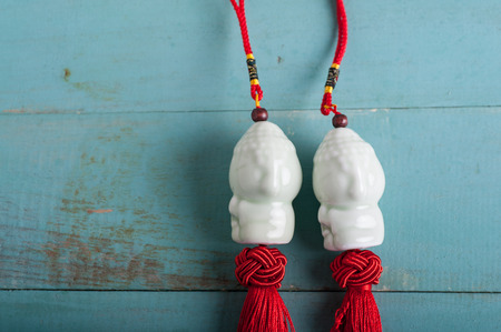 Ceramic Buddha hanging ornamentの写真素材